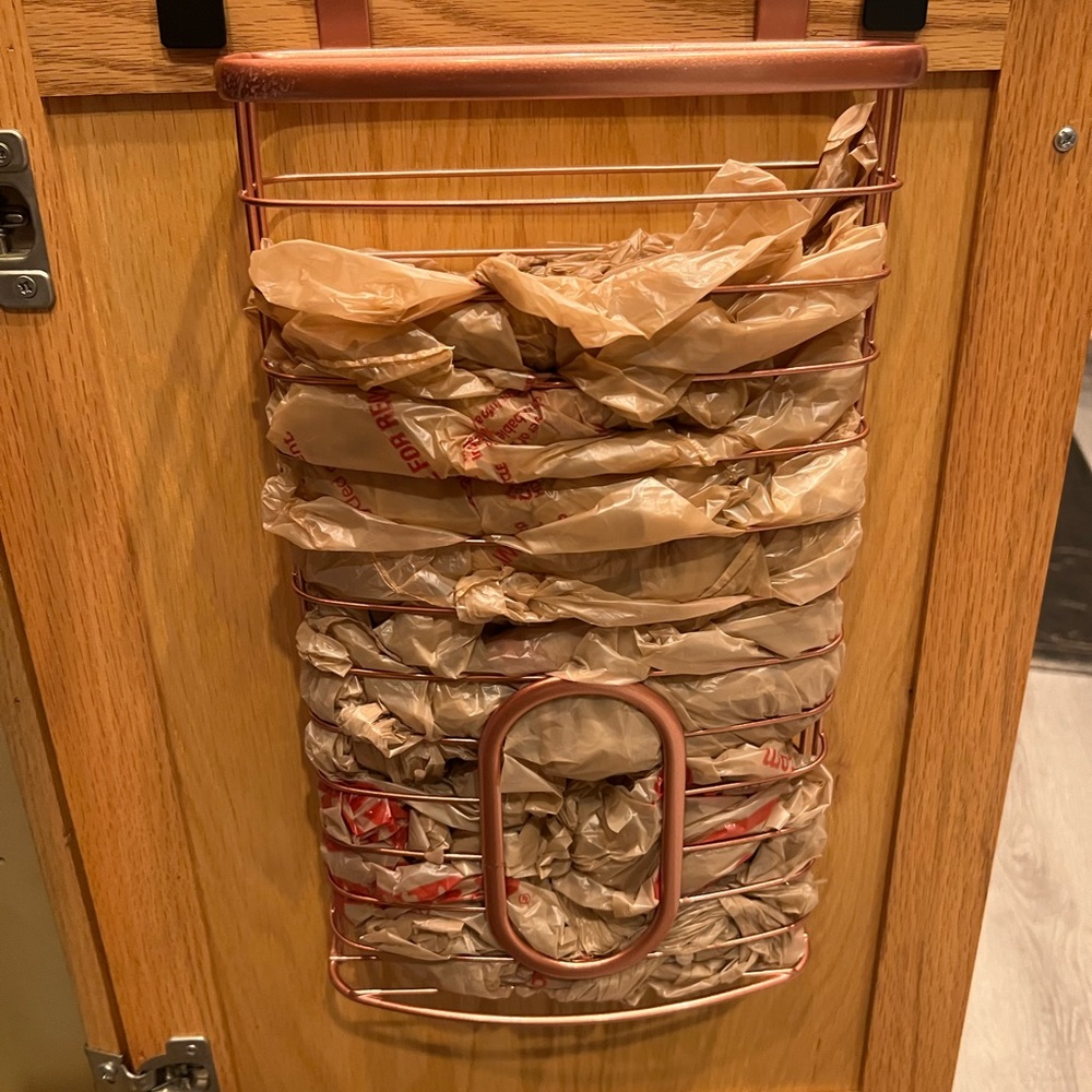 Copper over the cabinet bag holder